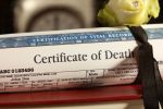 Death Certificate with a black ribbon and a single white Rose visual concept for a personal injury blog discussing wrongful death statute of limitations.